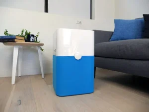 Blue air purifier, a modern and effective device for improving indoor air quality.